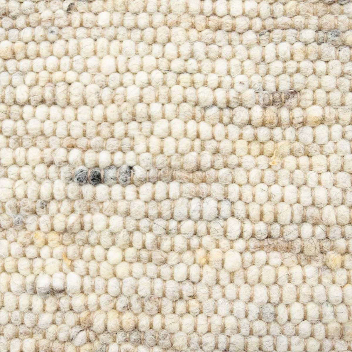 Dywan wełniany - Ylva beżowy - close up materiaal Dywan wełniany - Ylva beżowy - close up materiaal