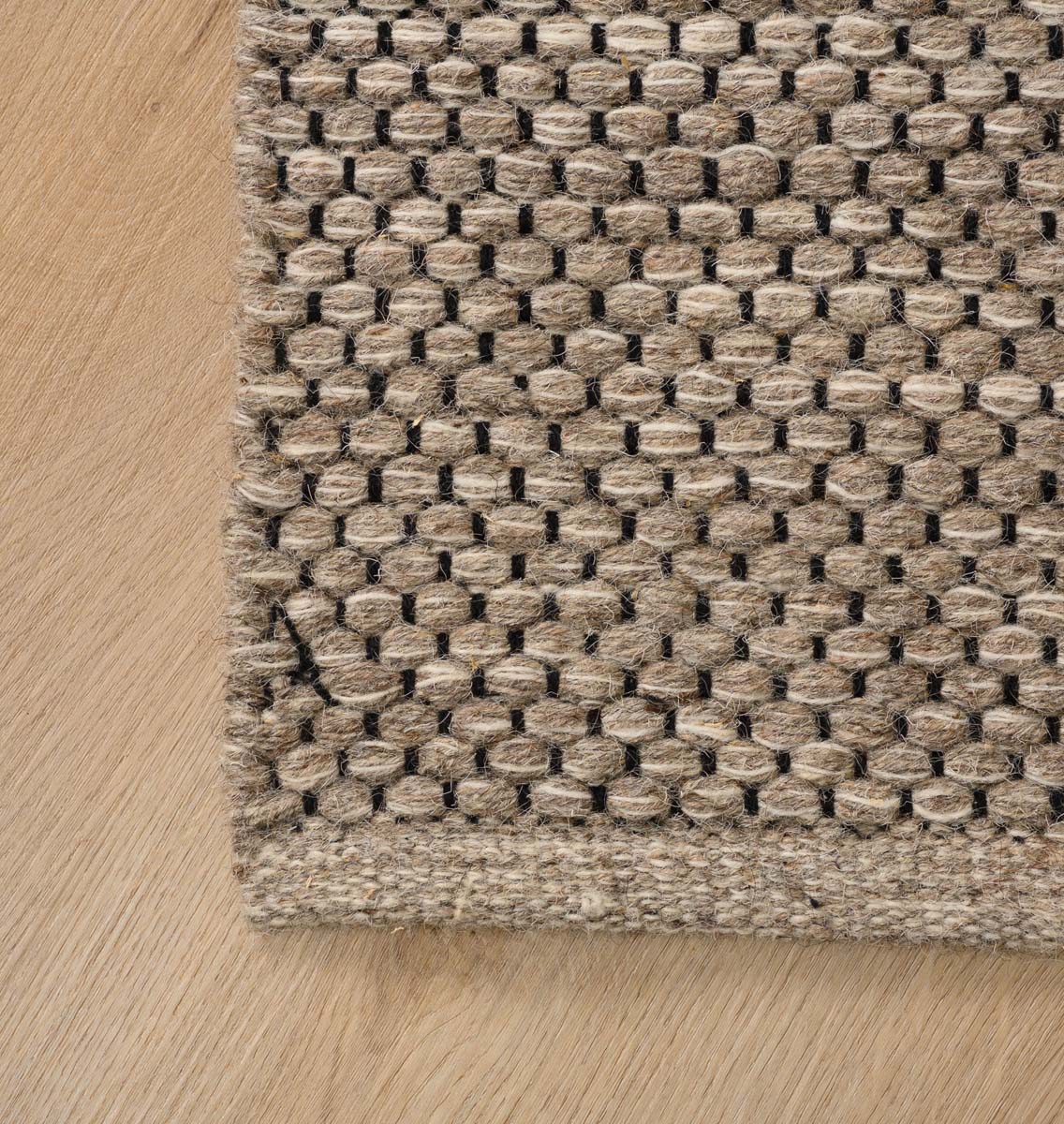 Dywan wełniany - Odda szary/taupe - close up hoek Dywan wełniany - Odda szary/taupe - close up hoek
