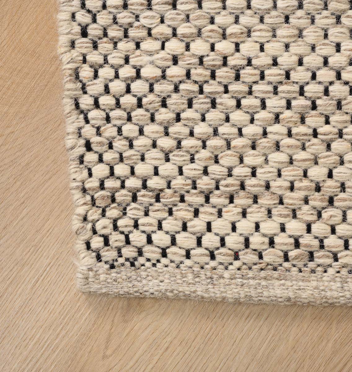 Dywan wełniany - Odda biały/taupe - close up hoek Dywan wełniany - Odda biały/taupe - close up hoek